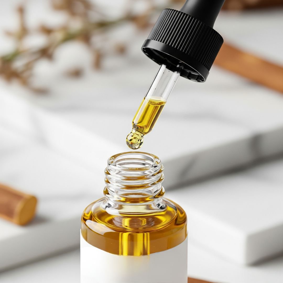 Dropper with golden licorice root serum, a gentle ingredient for skin brightening.